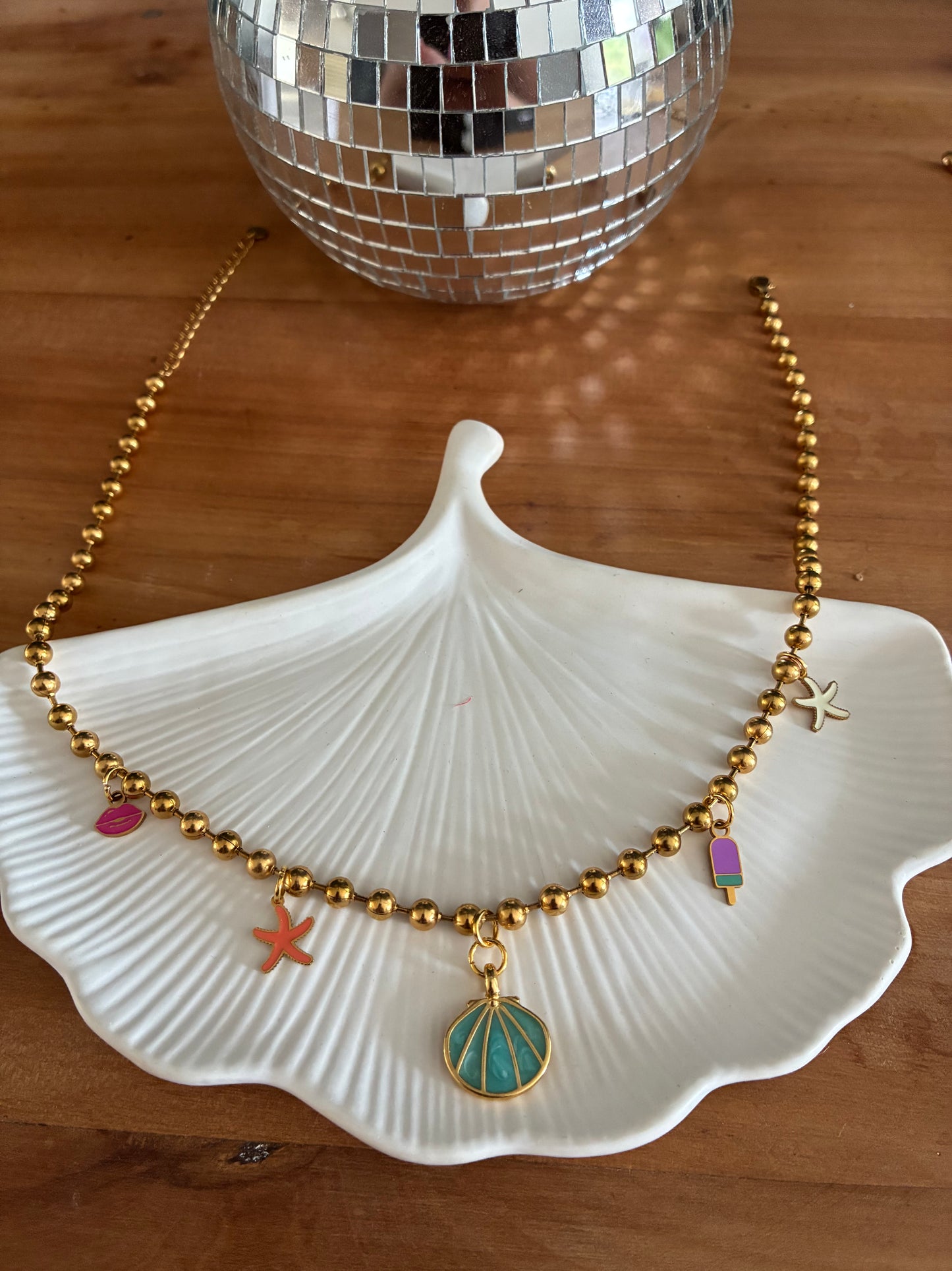 Collier doré coquillages étoiles