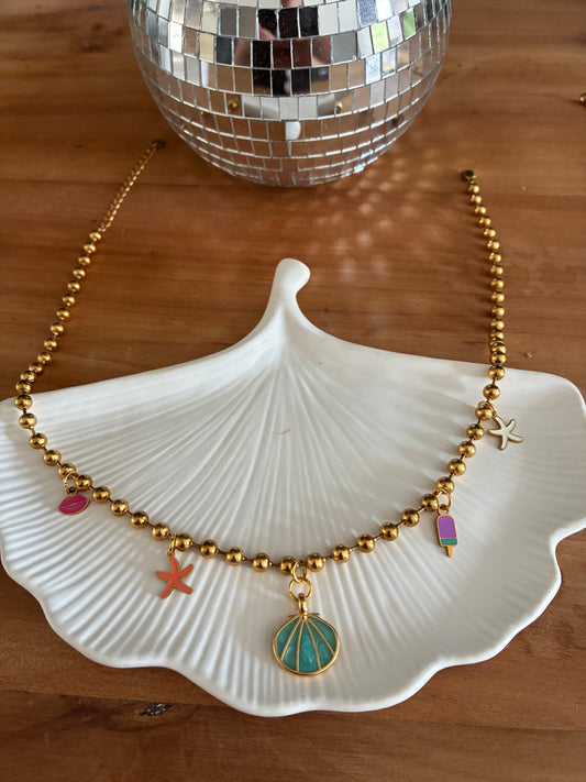 Collier doré coquillages étoiles